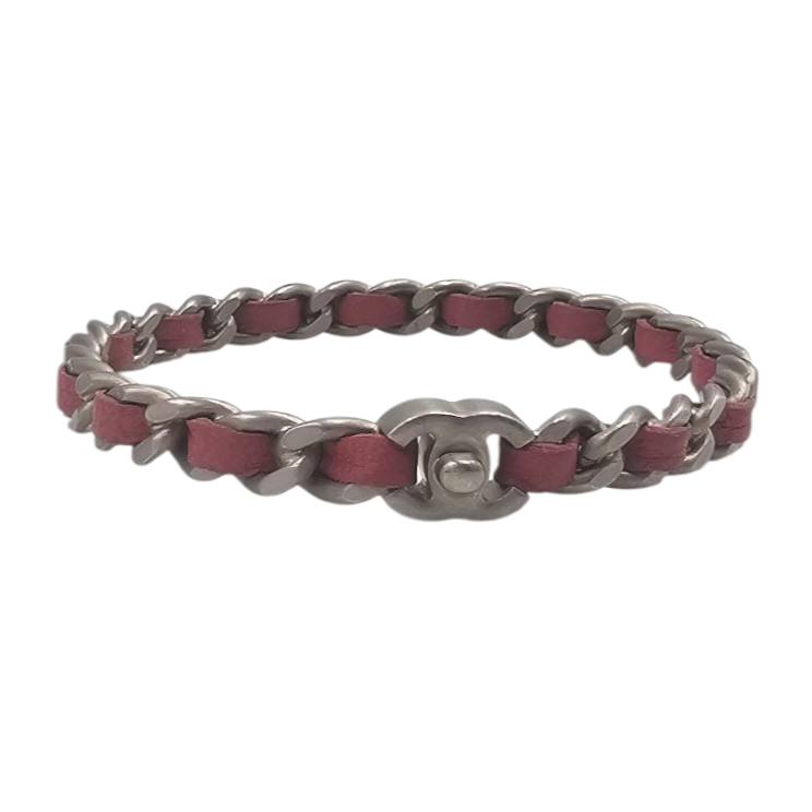 CHANEL PROTOTYPE BRACELET EN METAL VIEILLI ENTRELACE DE CUIR ROUGE CIRCA 1990