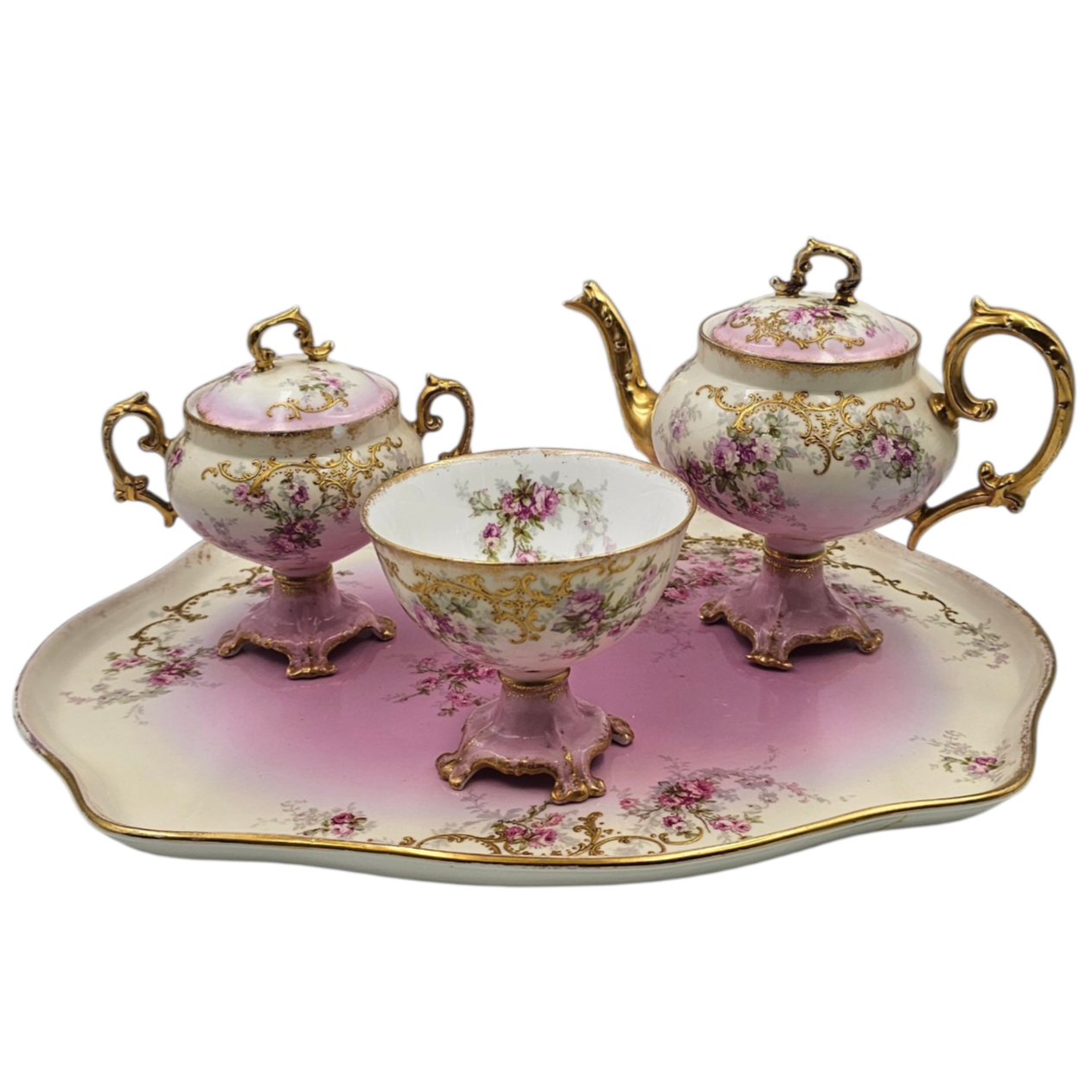 LIMOGES EGOISTE 4 PIECES EN PORCELAINE DECOR FLORAL (EN L ETAT)